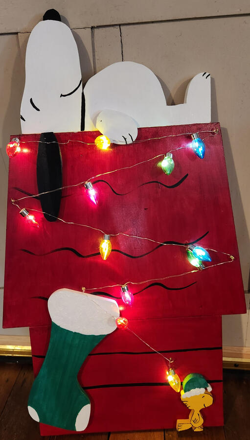 Snoopy on his decorated house